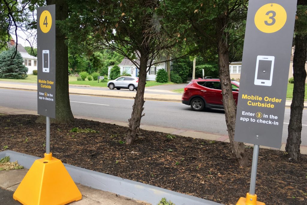 Curbside delivery for mobile orders at a McDonald's in suburban Maryland. / Skift