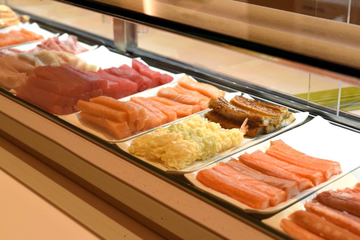 The fish counter at New York's MakiMaki displays fresh fish and creates made-to-order rolls. - Michael Tulipan