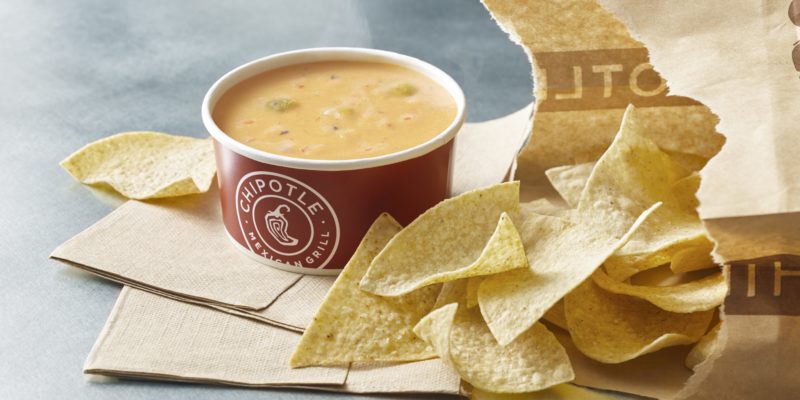 Chipotle's new queso product has let to strong reactions on social media. / Chipotle