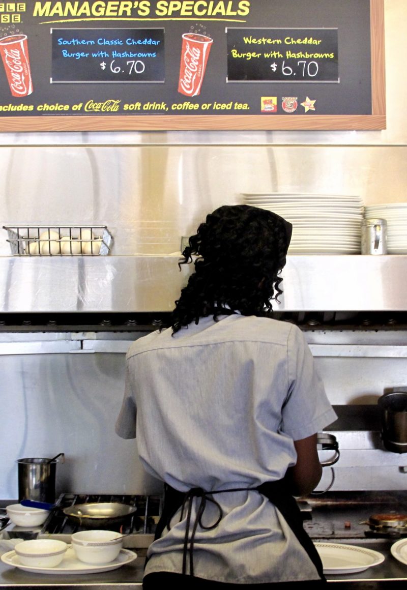 A restaurant worker at a Waffle House in Dallas, TX. - Matthew Rutledge / <a href='https://www.flickr.com/photos/rutlo/3885114485/'>Flickr</a>