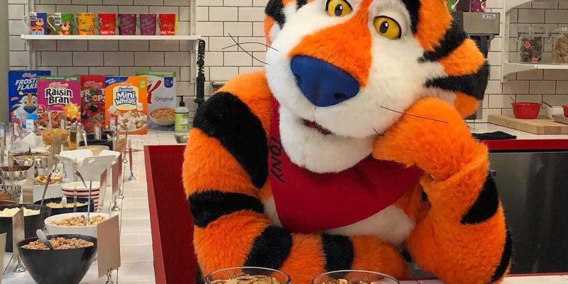 A person dressed as Tony the Tiger in Kellog's new New York City cafe. - Kellog's / <a href='https://www.instagram.com/kelloggsnyc/'>Instagram</a>