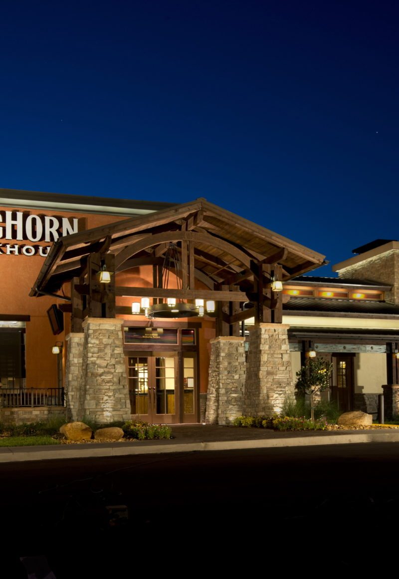 Exterior of a LongHorn Steakhouse. The chain's parent company says it will give employees additional benefits following the tax cut. / Darden Restaurants