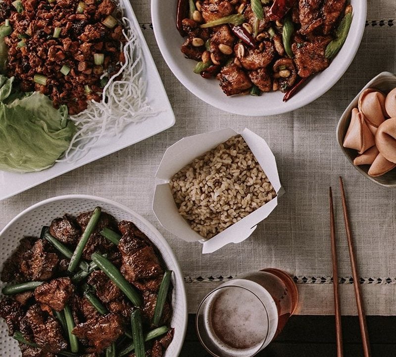 A promotional image of a spread at P.F. Chang's. The company's owner is looking to sell the Chinese-influenced casual chain. / P.F. Chang's Bistro