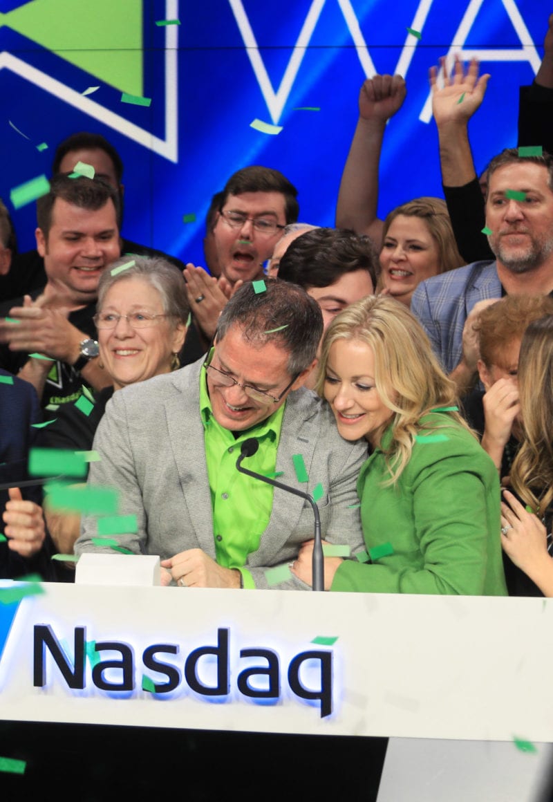 Waitr CEO Christopher Meaux and wife Missy Naquin Meaux celebrate the company going public on the Nasdaq stock exchange. / Waitr