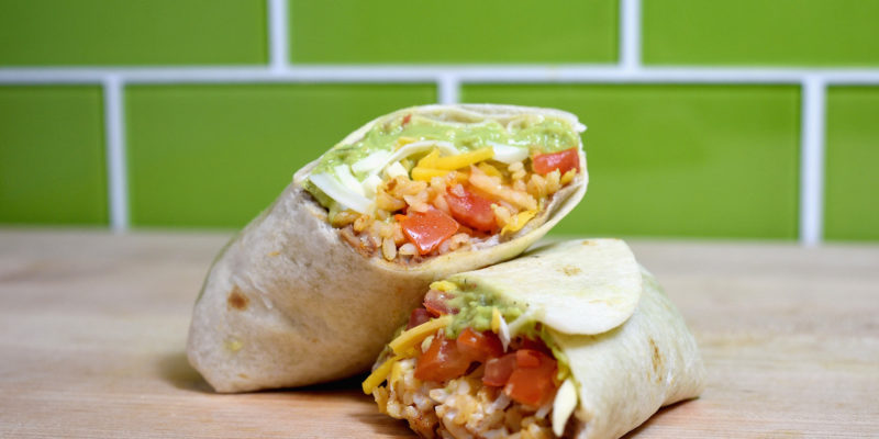 Taco Bell's seven-layer burrito, a popular vegetarian item on the chain's current menu. / Taco Bell