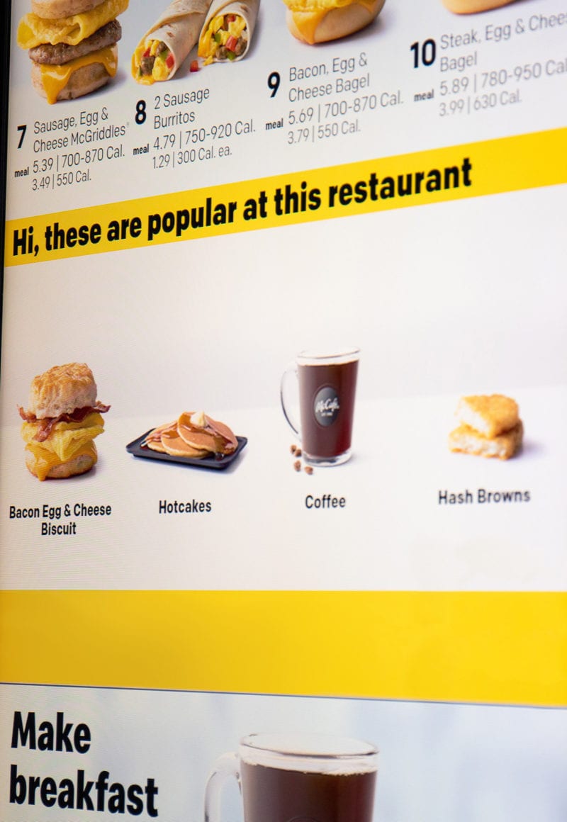 McDonald's plans on implementing Dynamic Yield's personalization technology in drive thrus, digital menu boards, and the company's mobile app. / McDonald's